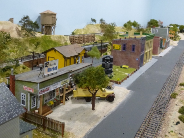 Jul: Richard's Market & a new upper retaining wall.