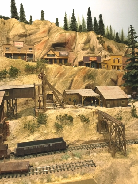 Improvements are made to the mountain  mining town.
