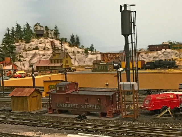 Added the Caboose Supply storage facility in the yard.