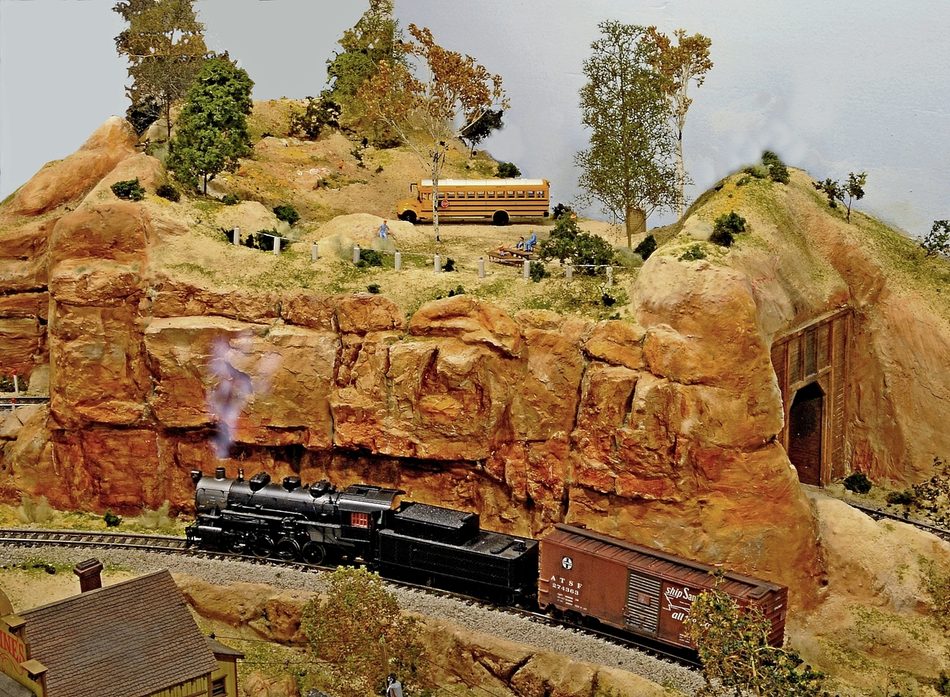 School Kids explore the Northside Paleobotanical Park as our 0-8-0 switcher moves a boxcar.